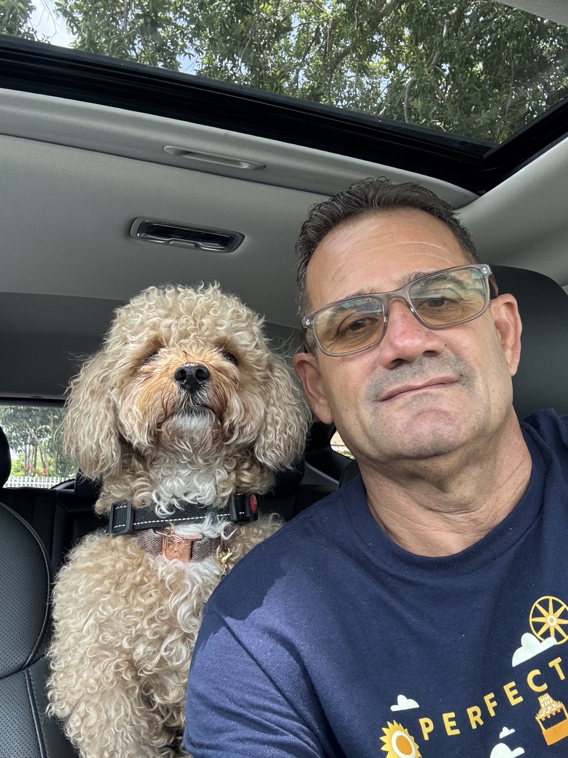Family moment with Muppy in the car